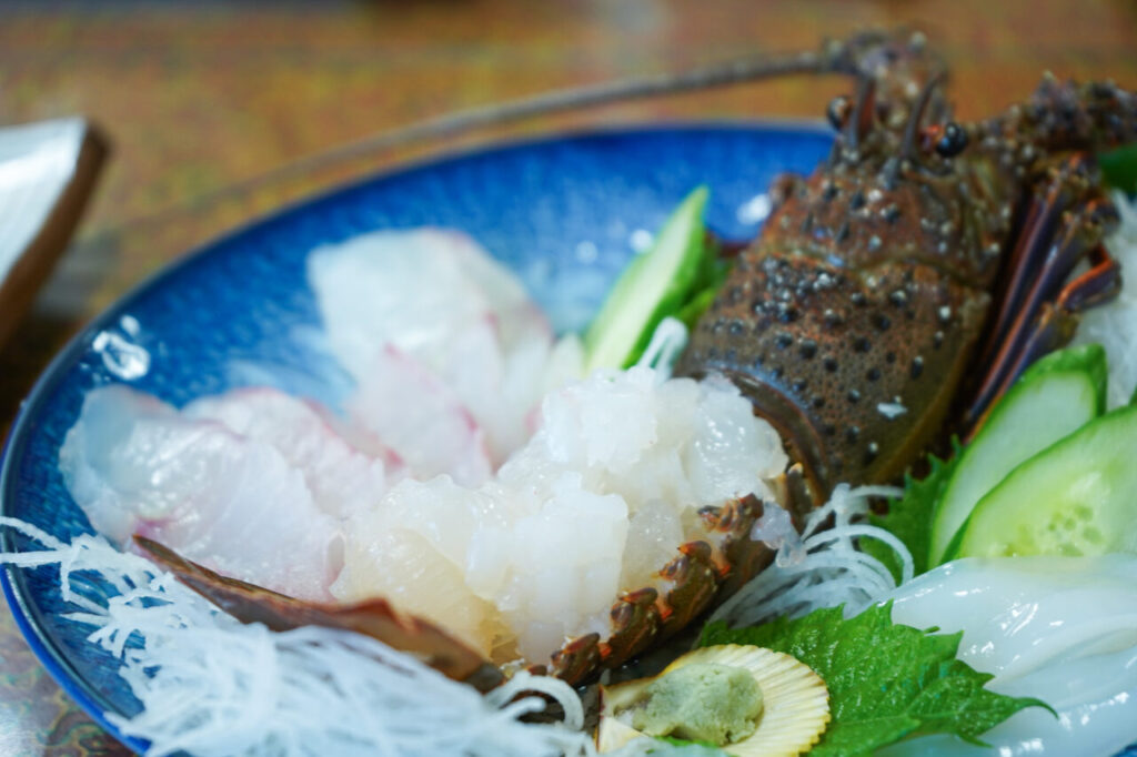 Ise-ebi spiny lobster served as ikezukuri with head and tail intact