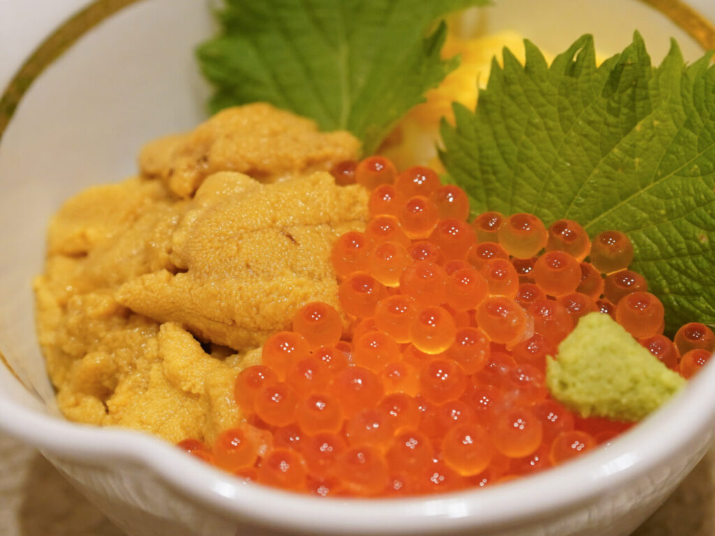 Sea urchin and salmon roe served together over rice